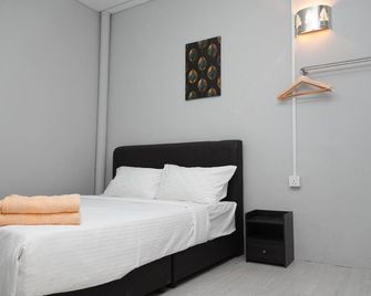 Ir Inn Hotel - Johor Bahru - Schlafzimmer