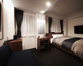 Okayama Square Hotel - אוקאימה - חדר שינה