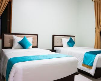 Ole Suite Hotel And Cottage - Bogor - Schlafzimmer