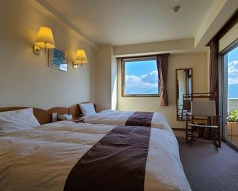 Terminal Hotel Toyo - Saijo - Slaapkamer
