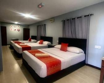 Grapevine Garden - קוטה קינבאלו - חדר שינה