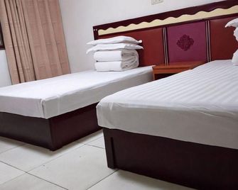 Longwang Housekeeping - تشانغشا - غرفة نوم