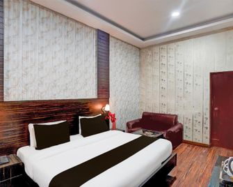 Super Hotel O Tyagi Road near Railway Station - Dehradun - Schlafzimmer