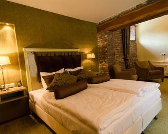 Hotel Schinvelder Hoeve - Brunssum - Спальня