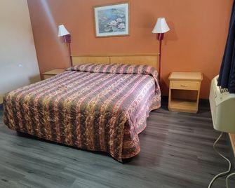 Budget Host Motel Gainesville - Gainesville - Schlafzimmer