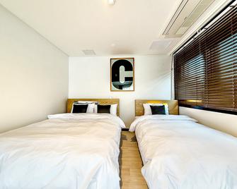 Jeju Nine Boutique Hotel - Seogwipo - Bedroom
