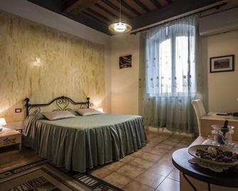 Locanda San Martino - Siena - Phòng ngủ