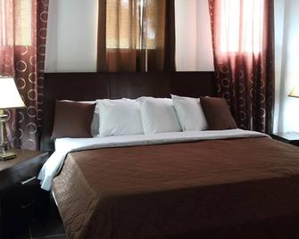 هوتل لا مايسون - بورت أوبرينس - غرفة نوم