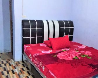 Penginapan Puncak Dp - Berastagi - Schlafzimmer