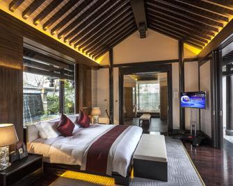 Yurun Hanyuelou Villa Resort Huangshan - הואנגשאן - חדר שינה