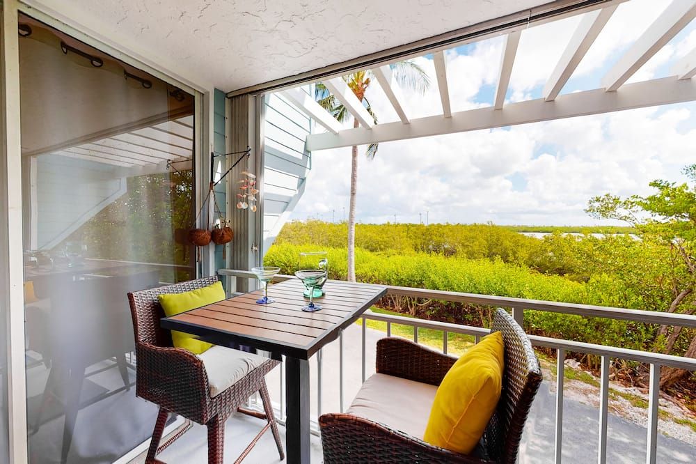 Wonderful Condo in Key West w/Free WiFi, Lanai, A/C, Shared Hot Tub & Pool - كي وست - شرفة