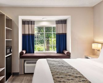 Microtel Inn & Suites by Wyndham Florence/Cincinnati Airport - פלורנס - חדר שינה