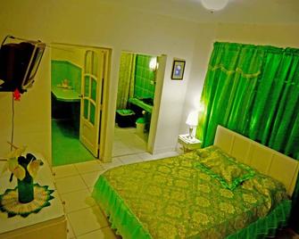 Hostal Dotres - Holguín - Slaapkamer