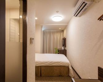 Kariyushi Lch. Premium - Naha - Bedroom