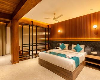 Hotel Stay Bella - Kozhikode - Bedroom