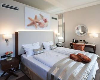 부티크 호텔 아드리아 - 벨츠 - 침실