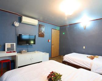 Woosung Hotel - Seogwipo - Habitación