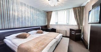 Interhotel Tatra - Kopřivnice - Bedroom