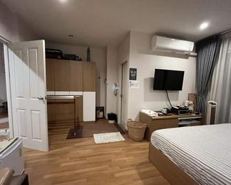 أوتا هاوس - بانكوك - غرفة نوم