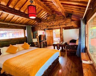 Day Boutique Hostel - ליז'יאנג - חדר שינה