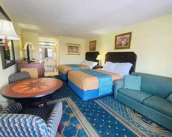 Maple Leaf Inn & Suites - Kissimmee - Bedroom