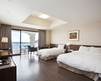 Songjung Hotel - Busan - Bedroom
