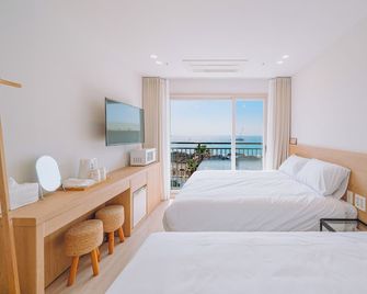 Jeju Mon Dieu Hotel - Чеджу - Спальня