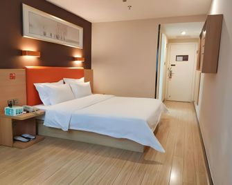 7 Days Premium·Fuzhou Tatou Road - פוז'ו - חדר שינה