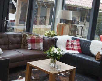 B&B - Pension Perruque - Koudum - Sala de estar