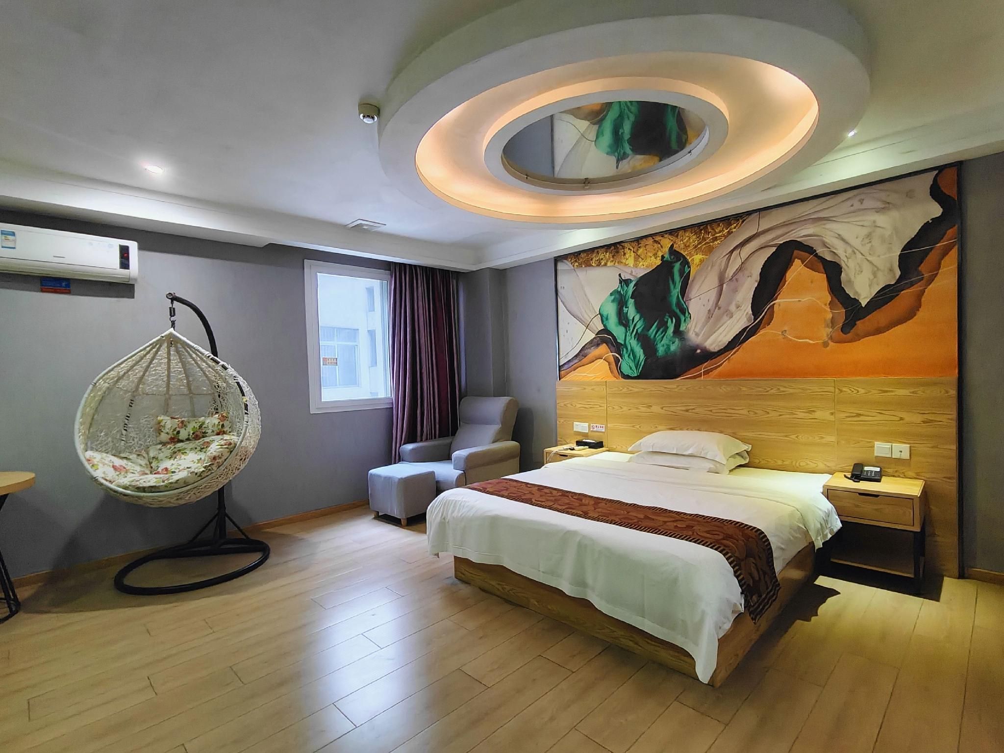 Lanli Lily Hotel (Xindacheng Times Square North Lake Park Store) - Yangjiang - Bedroom