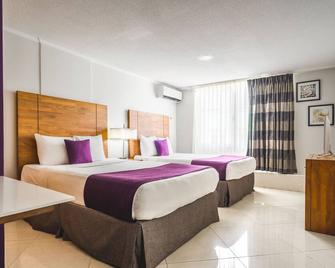 Majestic City Suites & Beach Hotel - ווילמסטאד - חדר שינה