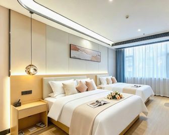 Jiuji Hotel (Ikea Haitang Metro Station Branch) - Che-fej - Ložnice