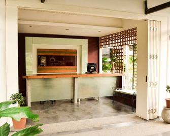 Qi Hotel and Club - Telipok - Recepción