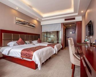 Jindu International Hotel - Zhumadian - Bedroom