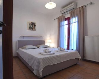 Glafki Studios & Suites - Panormos - Habitación