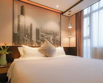 Guangdong Baiyun City Hotel - גואנגג'ואו - חדר שינה