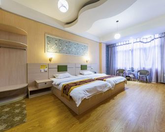 Tengjinyuan Hotel - Baoshan - Schlafzimmer