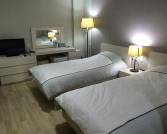Busan Central Hotel - Pusan - Yatak Odası