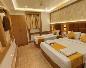 Hotel Riva International - Near Nesco Center - Mumbai - Schlafzimmer