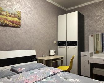 Chang'an Jianuo Apartment - Xi'an - Bedroom