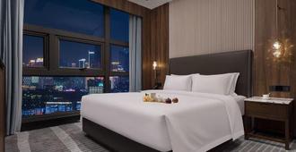 Yannian Shijia Hotel - Changsha - Schlafzimmer
