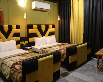 Almas Hotel - Mingaora - Bedroom