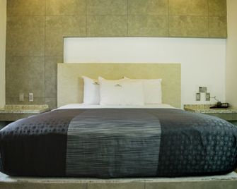 هوتل جاردين - تيجوانا - غرفة نوم