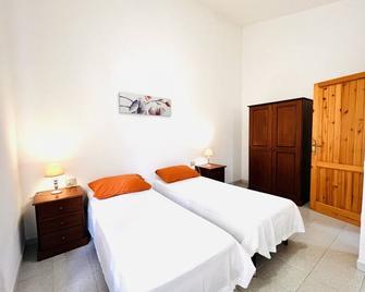 Residence La Cinta 8 - San Teodoro - Habitación