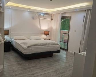 Mamta Villa - נוקו'אלופה - חדר שינה