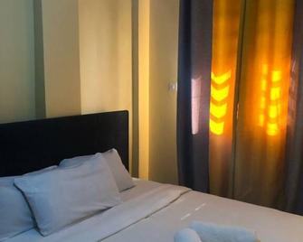 Lux Suites Airportview Apartments Kisumu - Kisumu - Bedroom