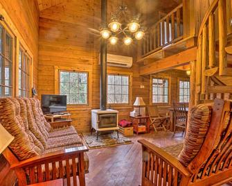 Scenic Log Cabin with Fire Pit and Stocked Creek! - Titusville - Living room