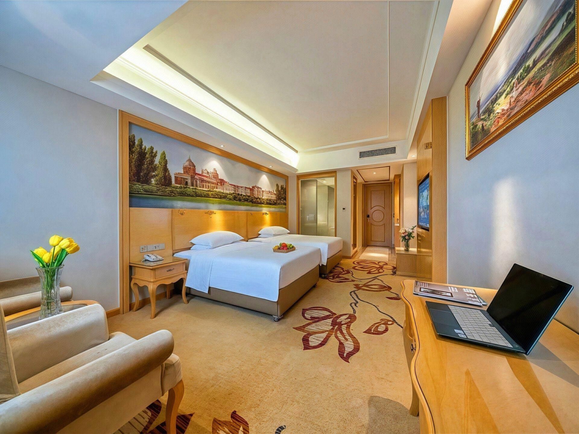 Vienna Hotel Shandong Weihai North High-Speed Railway Station Beaches Shandong University - Weihai - Bedroom