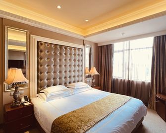 Ganzhou Yihao Hotel (Nanmenkou Yugutai Branch) - Ganzhou - Schlafzimmer