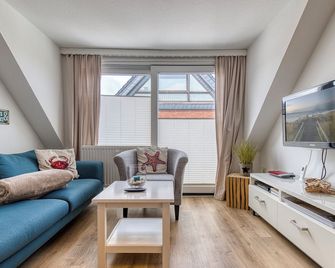 Vacation apartment 'Strandmuschel' - Wenningstedt-Braderup - Wohnzimmer